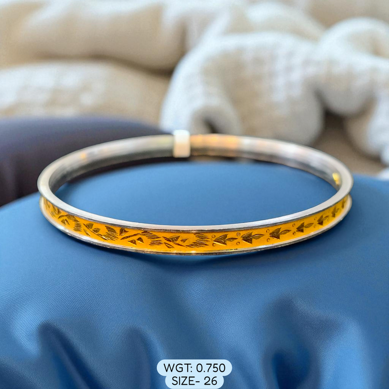 TRJ (SIZE: 26) WGT: 0.750 GM APPROX 22KT HUID HALLMARK GOLD NOA BANGLES (LAZER CHILA) 1 PIECE.